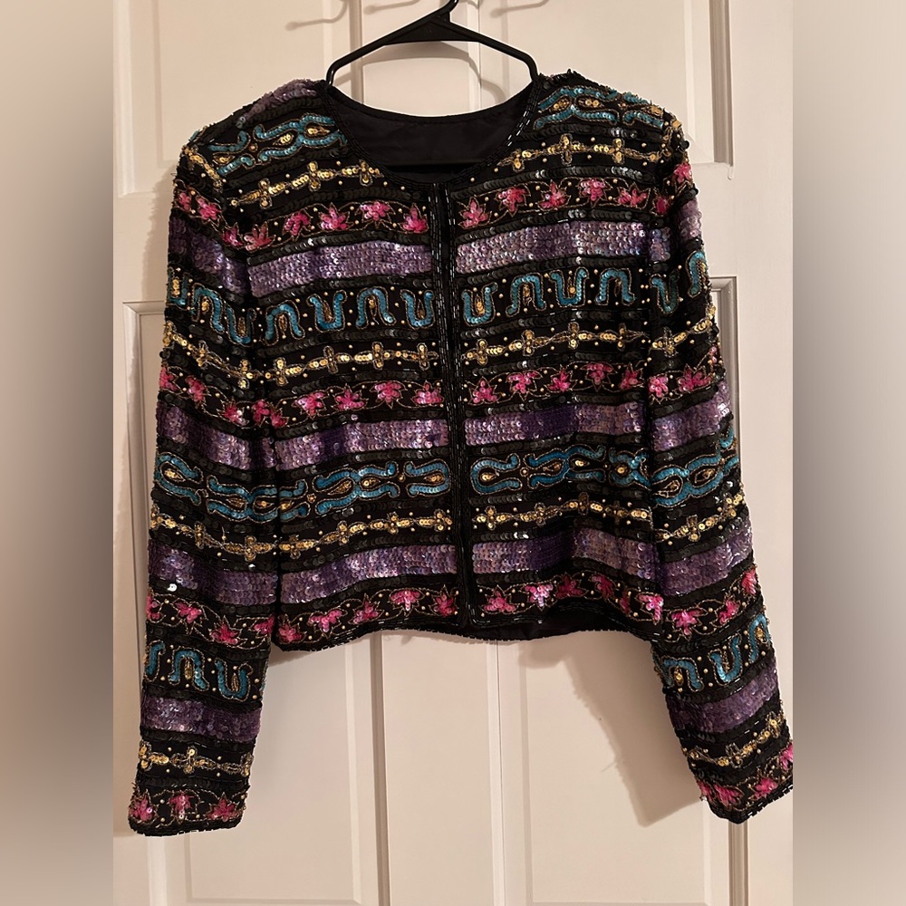 Beautiful handmade blouse, a little bit heavy.